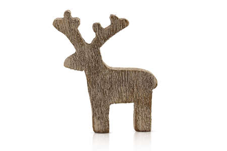 White and brown textured wooden deer on a white isolated background. Christmas, New Year. Design elementの写真素材