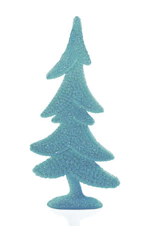 Blue shiny Christmas tree with shimmer on white isolated background. New Year. Design elementの写真素材