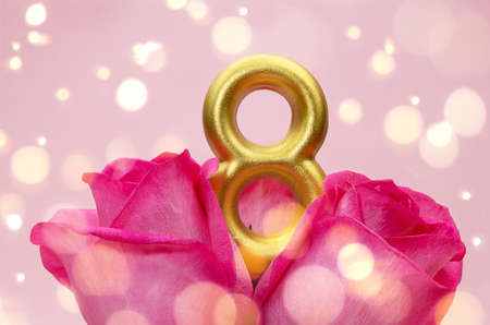 Bouquet of pink roses with number eight, bokeh. Holiday, March 8, International Women's Day. copy spaceの写真素材