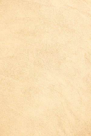 Yellow small sand beach background. Concept of relaxation, sea. copy spaceの写真素材