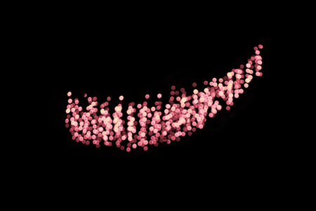 Defocused pink lights on black isolated background. design element. Christmas, New Year, holiday. copy spaceの写真素材