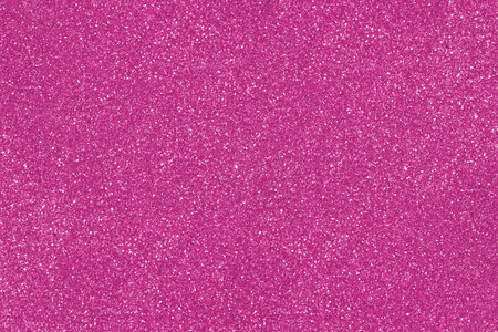 Pink abstract textured background with shimmer, glitter and shine. Merry Christmas or new year bokeh. Saint Valentine day card. copy spaceの写真素材