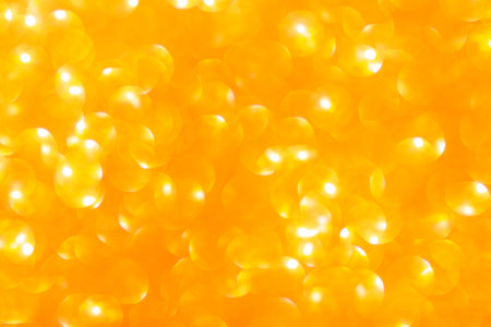 Abstract yellow background. Defocus light with bokeh. Spring, Summer, Christmas, New Year. copy spaceの写真素材
