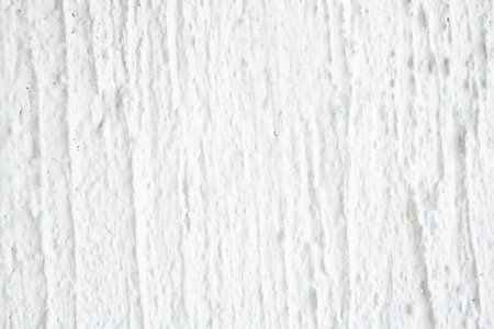 Background light grey, embossed plaster with stripes and scratches. Background, texture, wall, facing. copy spaceの写真素材