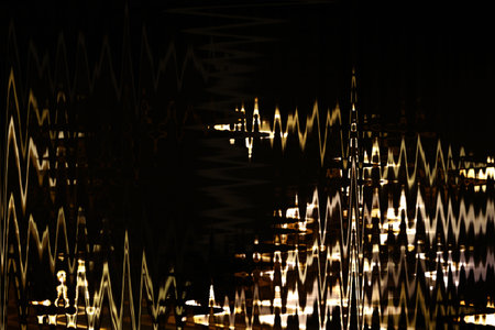 Yellow abstract wave motion background with curly lines. Design element for magicの写真素材
