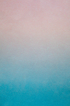 Blue pink beige sparkling glitter background with shimmer. Shiny grainy paper with gradient coating. Holiday, Christmas, New year, birthday. copy spaceの写真素材