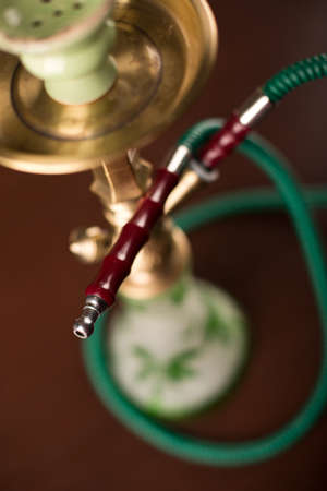 Eastern hookah on wood tableの写真素材