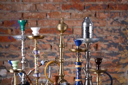 group of eastern hookahs on table