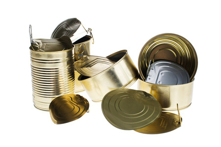Several cans of food isolated on white