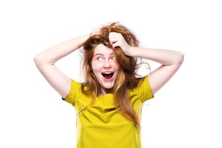Portrait of crazy and happy young girl isolated on white
