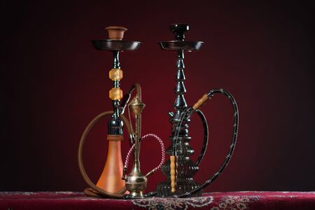 Eastern hookahs on carpetの写真素材