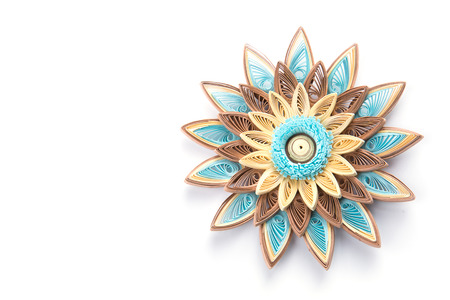 flower made quilling on a light background