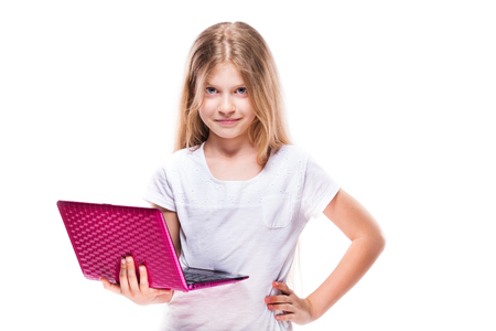 Pretty young girl with pink netbook isolated on white.の写真素材
