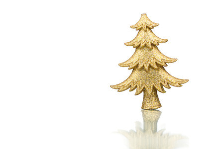 Gold Christmas fir-tree decoration isolated on white background.の写真素材