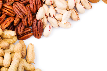 Nut mix. Peanuts, pecans, pistachios on white background.
