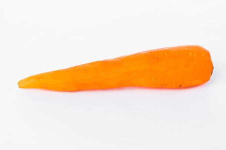 peeled and juicy carrot on white backgroundの写真素材