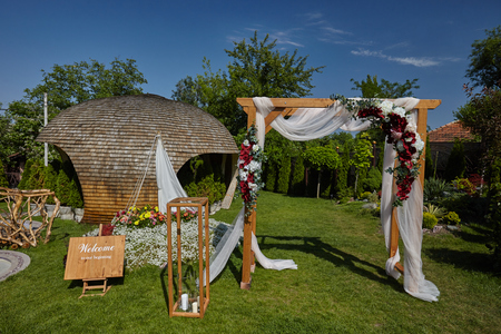 wedding arch, beautiful wedding decorations in natureの写真素材