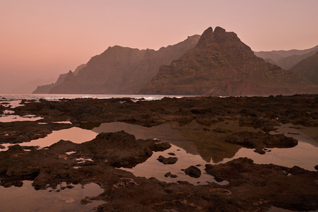 volcanic lava and mountains in the ocean, tenerifeの写真素材