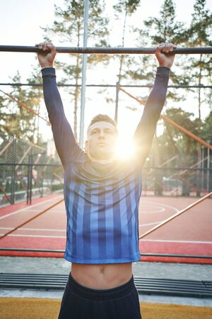 young guy goes in for sportsの写真素材