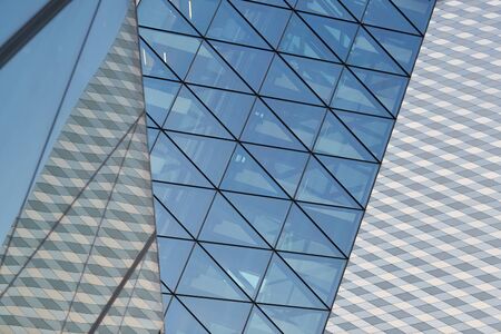 glass facade of a skyscraper in a megalopolis
