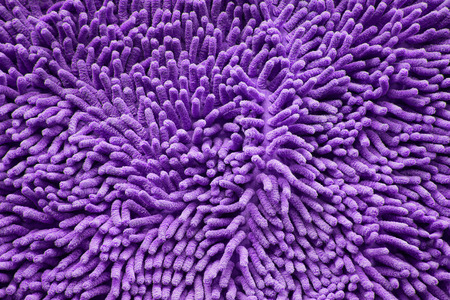 purple cleaning doormat or carpet textureの写真素材