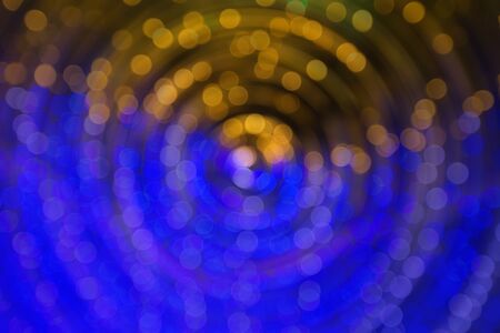 Colourful defocused lights on dark background background, abstract, backgroundsの写真素材