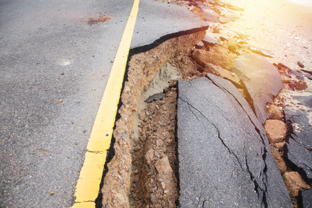 Crack of asphalt road after stormの写真素材