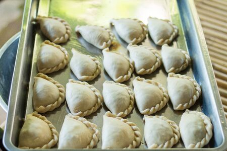 curry puff   Before fryingの写真素材