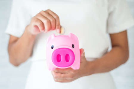 Saving money for the future in a piggy bank