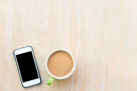 Coffee and smart phone. Breakfast in the morning on an copy space and using smart phone. The Creative modern Business top viewの写真素材