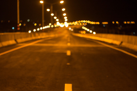 Paved roads and traffic lines Refreshing new at nightの写真素材