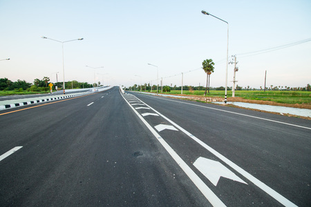 Paved roads and traffic lines Refreshing new in evning