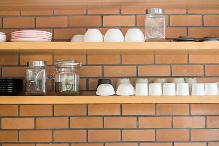 Coffee cup rack And dish cup accessories The brick wall is blocked.の写真素材