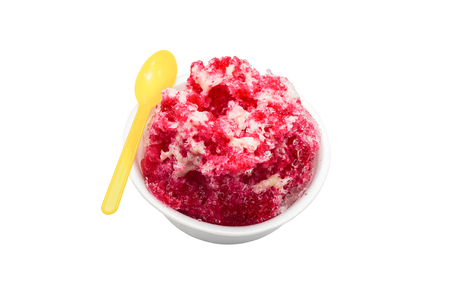 Dessert made of ice crushed with syrup and filled with red and condensed milk, isolated on white background ,with clipping pathの写真素材