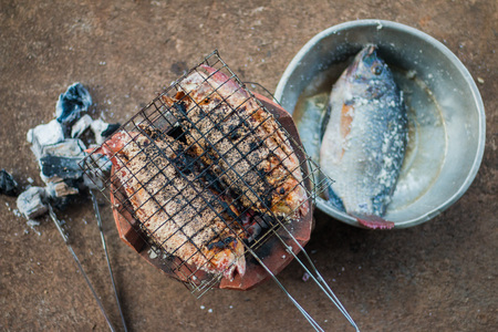 Grilled fish On the charcoal stove, cookedの写真素材