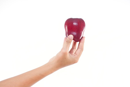 Men hand holding the red apple on white isolate background.