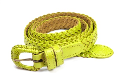 Women's leather belt on white background.の写真素材