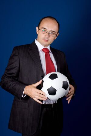 Business with soccer ball (football). Isolated.の写真素材