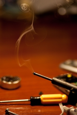 Soldering iron and smoke close upの写真素材
