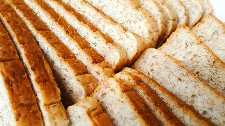 Close-up on bread slice isolated on white