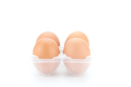 Single brown chicken egg isolated on white.の写真素材