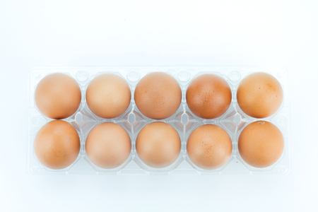 Single brown chicken egg isolated on white.の写真素材