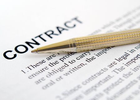 Pen on the contract papersの写真素材