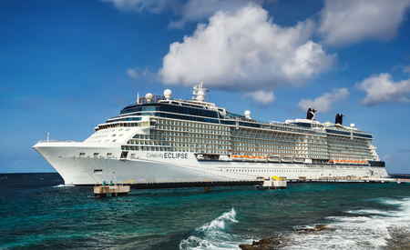 WILLEMSTAD, CURACAO - APRIL 10, 2018:  Cruise ship Celebrity Eclipse docked at port Willemstad. The island is a popular Caribbean cruise destinationのeditorial素材