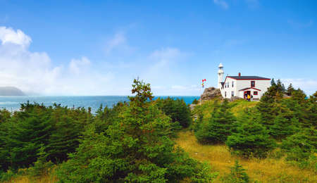 Panorama of Lobster Cove Head Lighthouse in Gros Morne National Park, Newfoundlandの写真素材