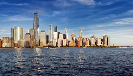 Panorama New York City  with Manhattan Skyline over Hudson River on sunset.の写真素材