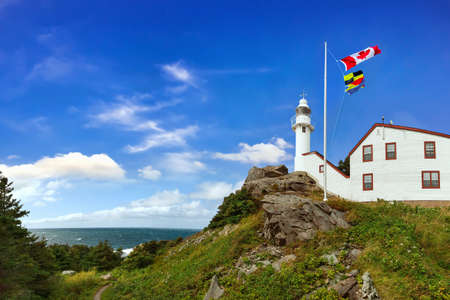 Panorama of Lobster Cove Head Lighthouse in Gros Morne National Park, Newfoundland, Canadaの写真素材