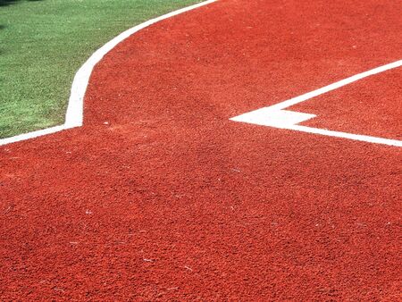 a baseball field done in bright recycled materials for small children to play on