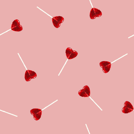 Candy sweet hearts pattern vector. Seamless vector pattern with hand drawn sketch lollipops. Wrapping textile fabric wallpaper valentines love design.のイラスト素材