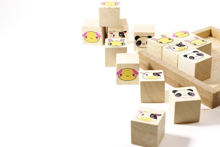 Isolated wooden toy blocks on white 